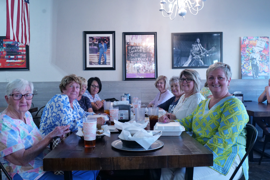 Group of people enjoying That Little Pork Shop atmosphere